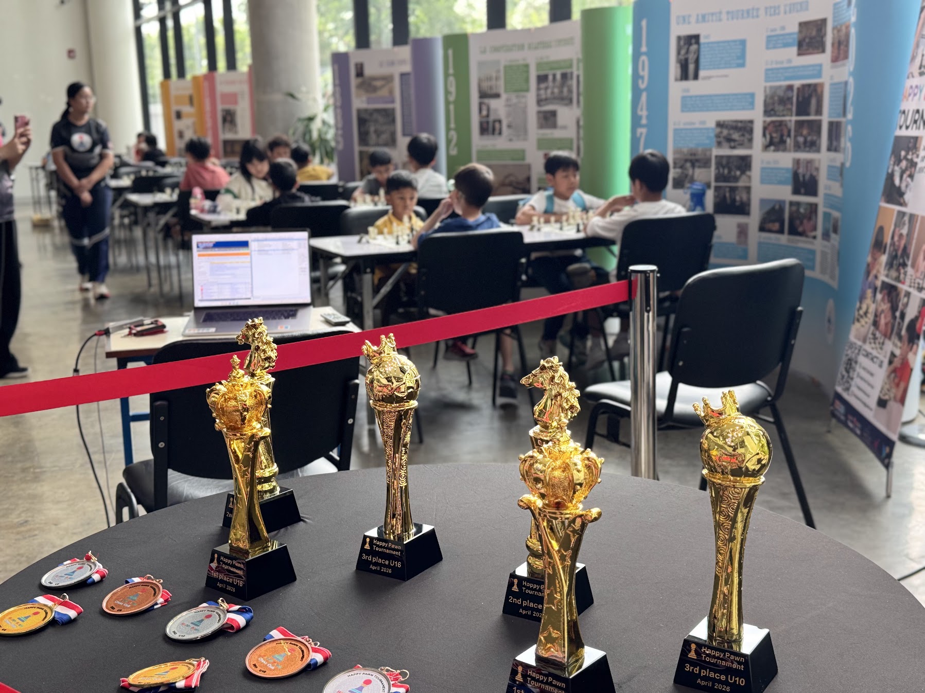 Trophies and medals awarded at Happy Pawn tournaments